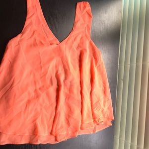 flowy peach colored blouse